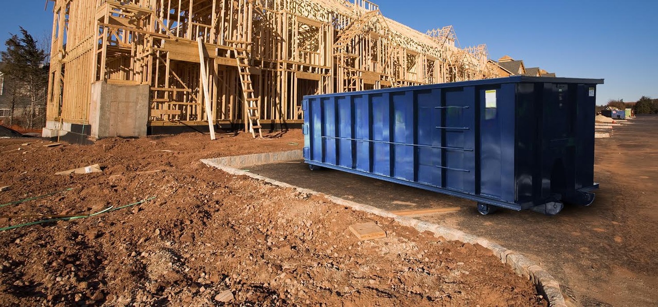 Roll-off dumpster at a residential construction jobsite